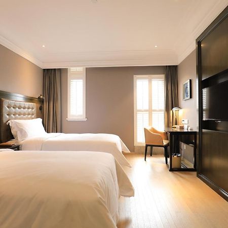 Jinjiang Metropolo Hotel Classic Nanjing Road Шанхай Екстер'єр фото